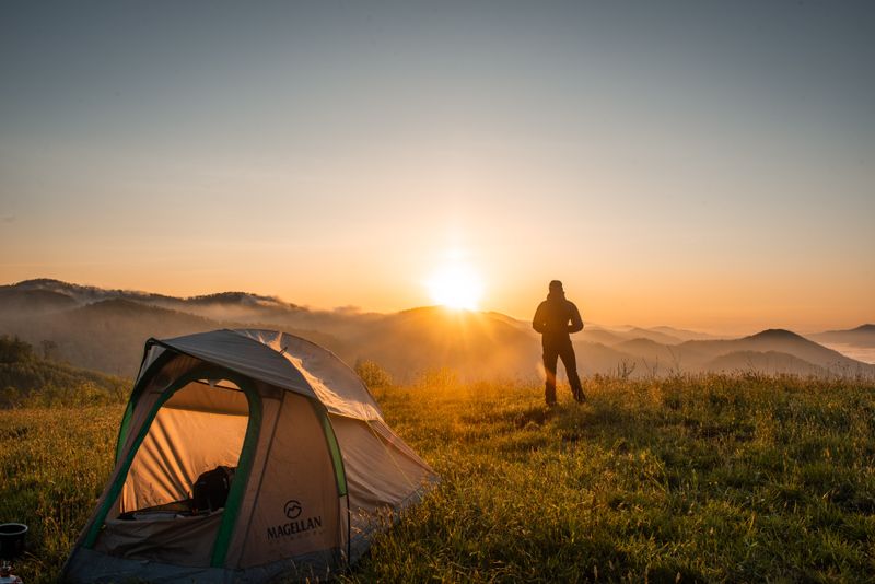 Solo dome tent at a festival campsite